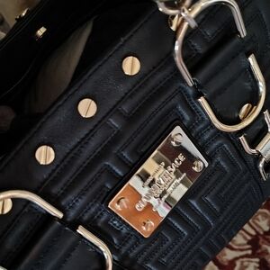 Versace Black and Gold Madonna Snap Out Of It Bag In Like New Condition.
